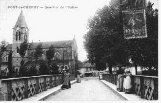 Le pont métallique et l'église vers 1900